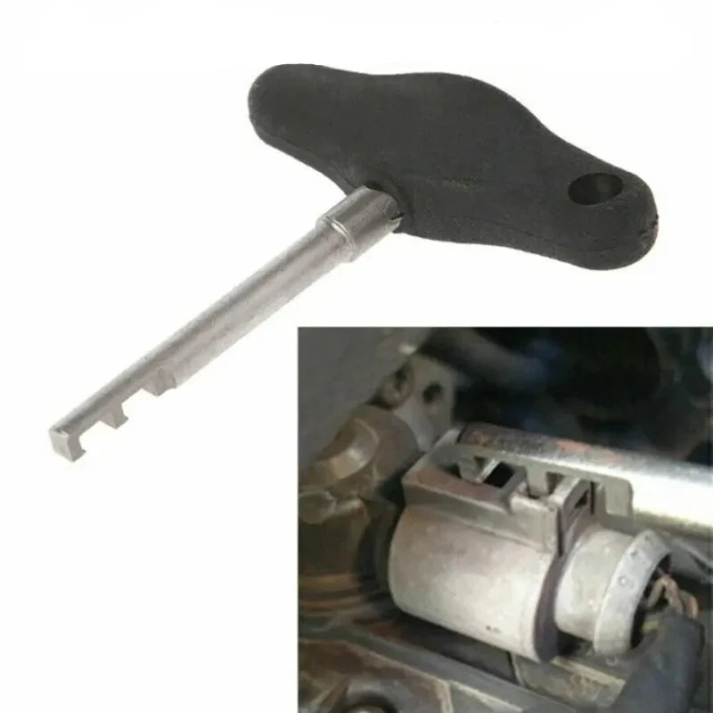 VAG electrical connector removal tool in use in engine bay