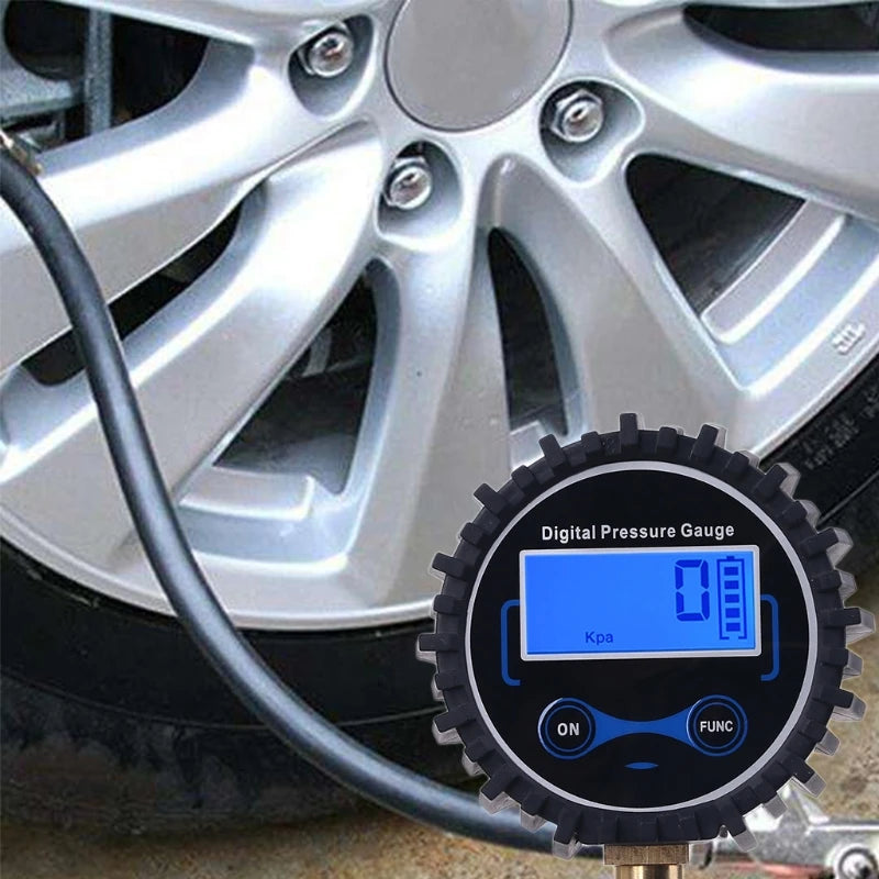 Digital Tire Pressure Gauge - In-use shot showing gauge connected to alloy wheel valve stem during tire pressure check | Wrench Haus