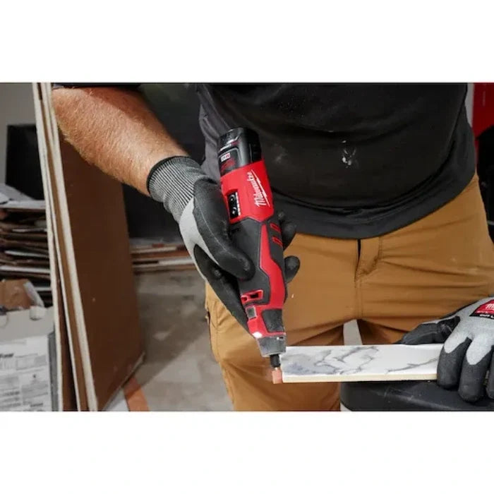 Milwaukee 2525-21 M12 Brushless Rotary Tool Kit - rotary tool sanding a wood surface
