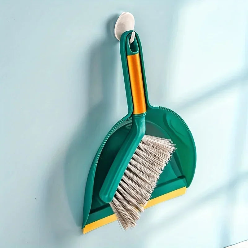 Mini Dustpan & Brush Set - Mini dustpan and brush set hung on wall hook showing hanging hole storage design | Wrench Haus