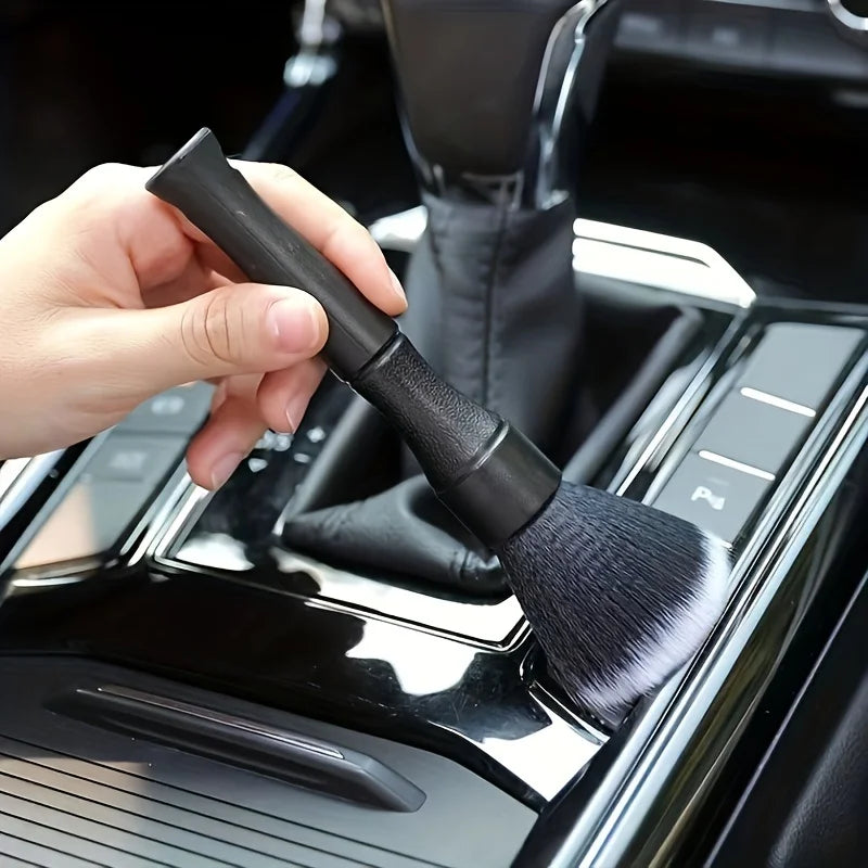 Dash duster brush cleaning a car dashboard