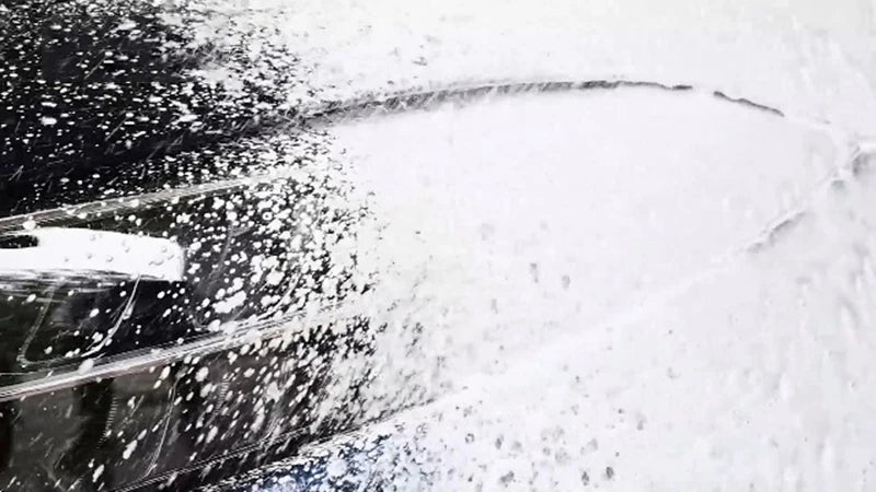 Snow foam cannon attached to pressure washer