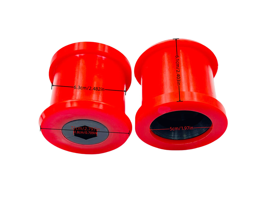 Two red polyurethane control arm bushings side by side, showing the outer shell and inner bore | Wrench Haus