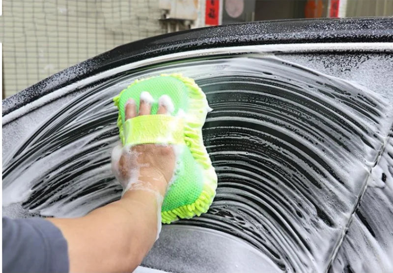 Car wash sponge soaking up soapy water