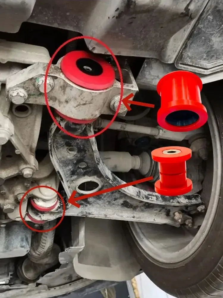 Underside view of the front suspension marking where each red control arm bushing fits | Wrench Haus