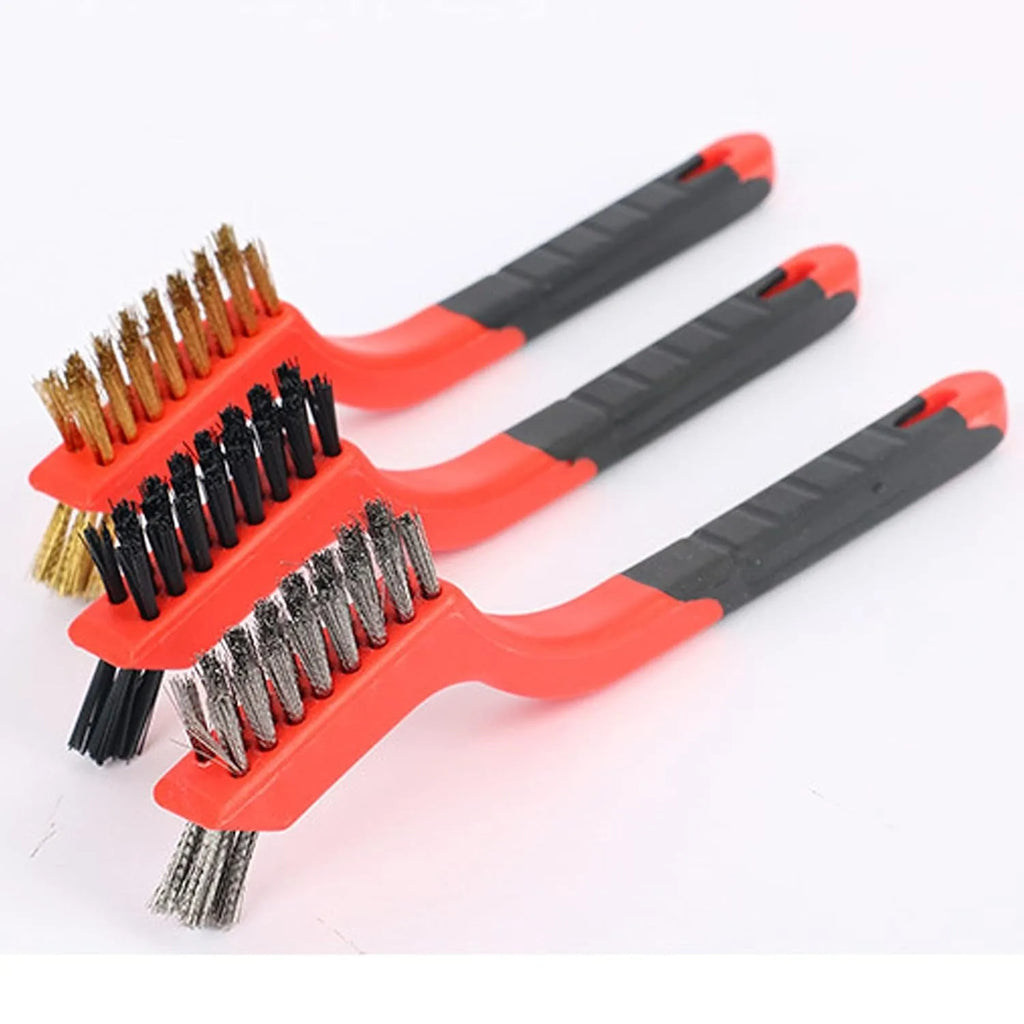 Wire Brush Set for Cleaning Rust - Brass, stainless steel, and nylon wire brushes with red ergonomic handles, fanned out | Wrench Haus