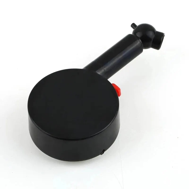 Analog Tire Pressure Gauge - Top-down view of round black gauge body showing dial face and knurled grip | Wrench Haus