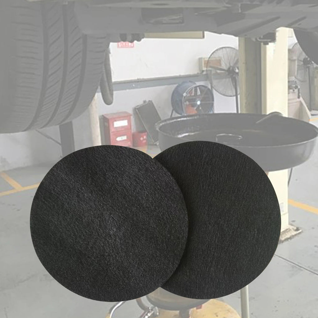 Oil Drain Splash Pad - Black rubber round pads in use in automotive workshop setting | Wrench Haus