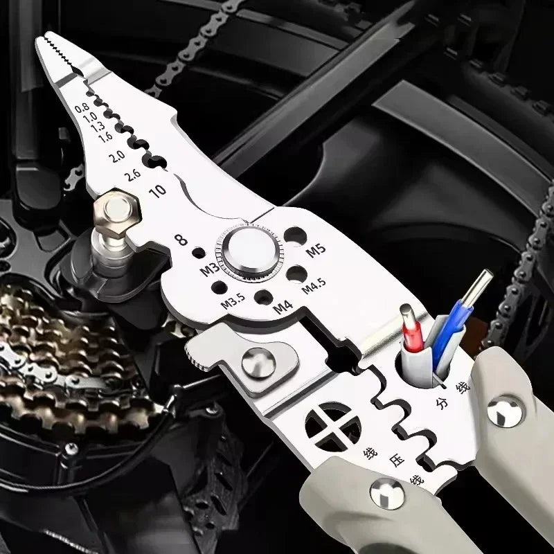 Multifunctional Wire Stripper & Electrician Pliers - Wire stripper pliers in use in automotive engine bay stripping and cutting wires | Wrench Haus