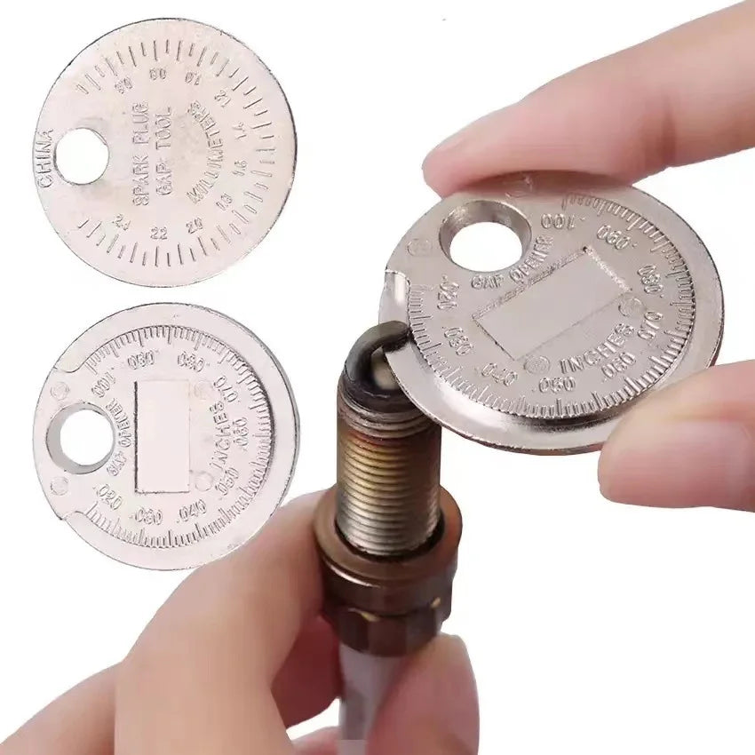 Spark plug gap gauge measuring a spark plug