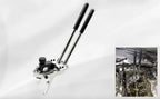 BMW valve spring compressor with handles closed together, shown upright with inset in the engine | Wrench Haus