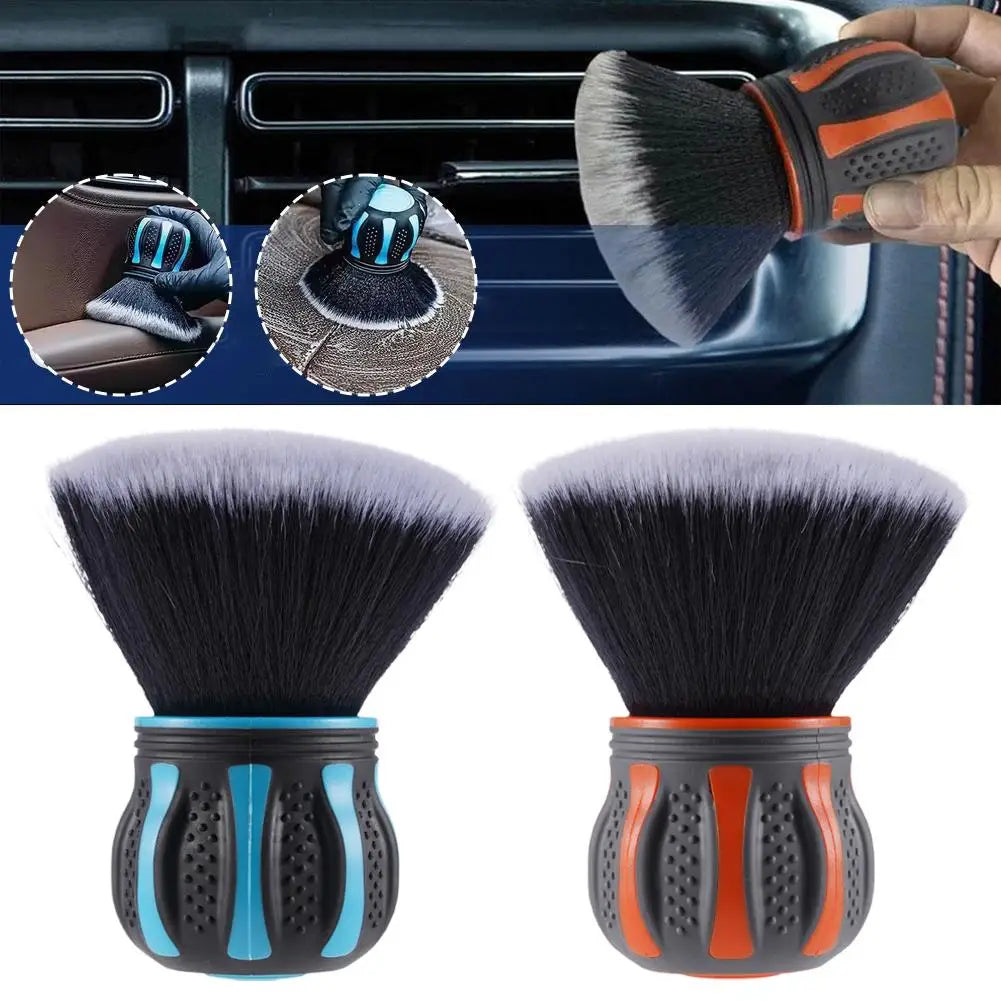 Detailing brush cleaning a car air vent