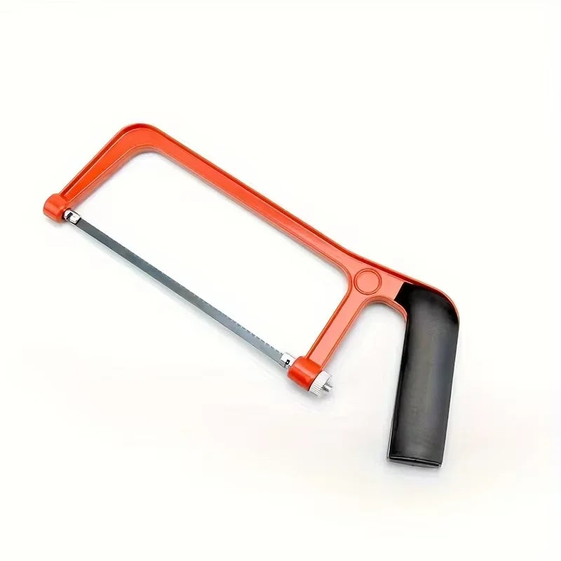 Mini hacksaw replacement blades laid out next to saw