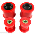 Set of four red polyurethane control arm bushings, two large and two small with metal sleeves | Wrench Haus