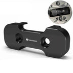Aluminum Transmission Mount Insert - Black anodized billet aluminum insert shown alongside in-situ installation reference on transmission housing | Wrench Haus