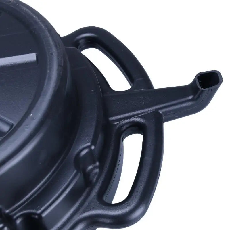 Oil drain pan under a vehicle during oil change