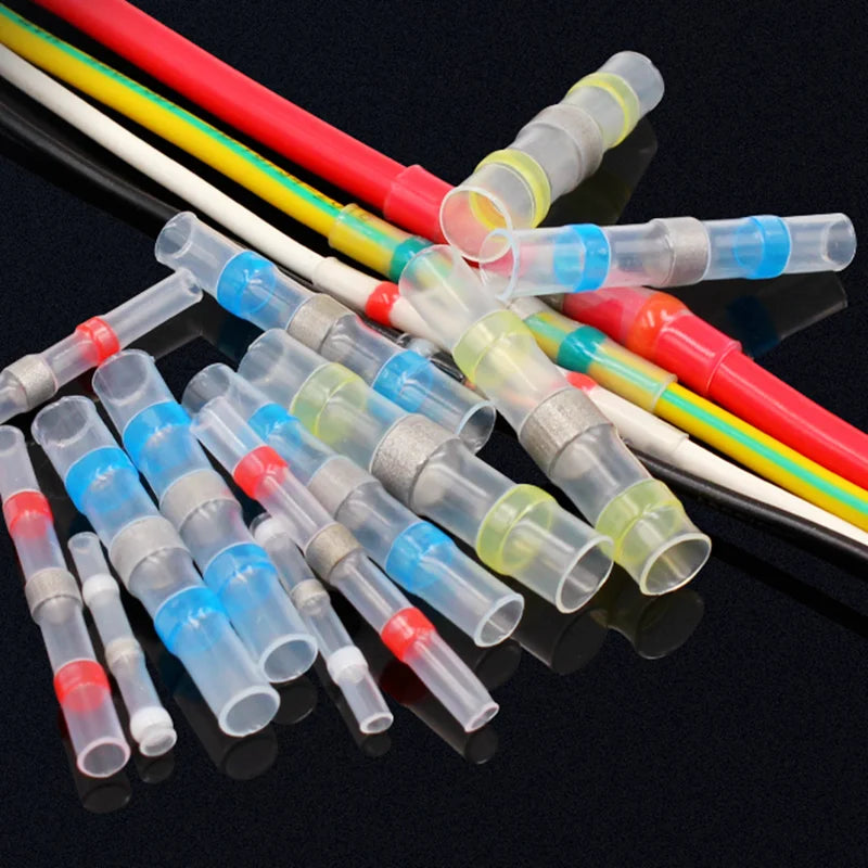 IP67 Waterproof Heat Shrink Wire Connector Terminals - Assorted red, blue and white solder ring heat shrink terminals installed on multiple wire colors | Wrench Haus