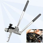 BMW N52/N54/N55 valve spring compressor with handles spread open, inset of hands using it on engine | Wrench Haus