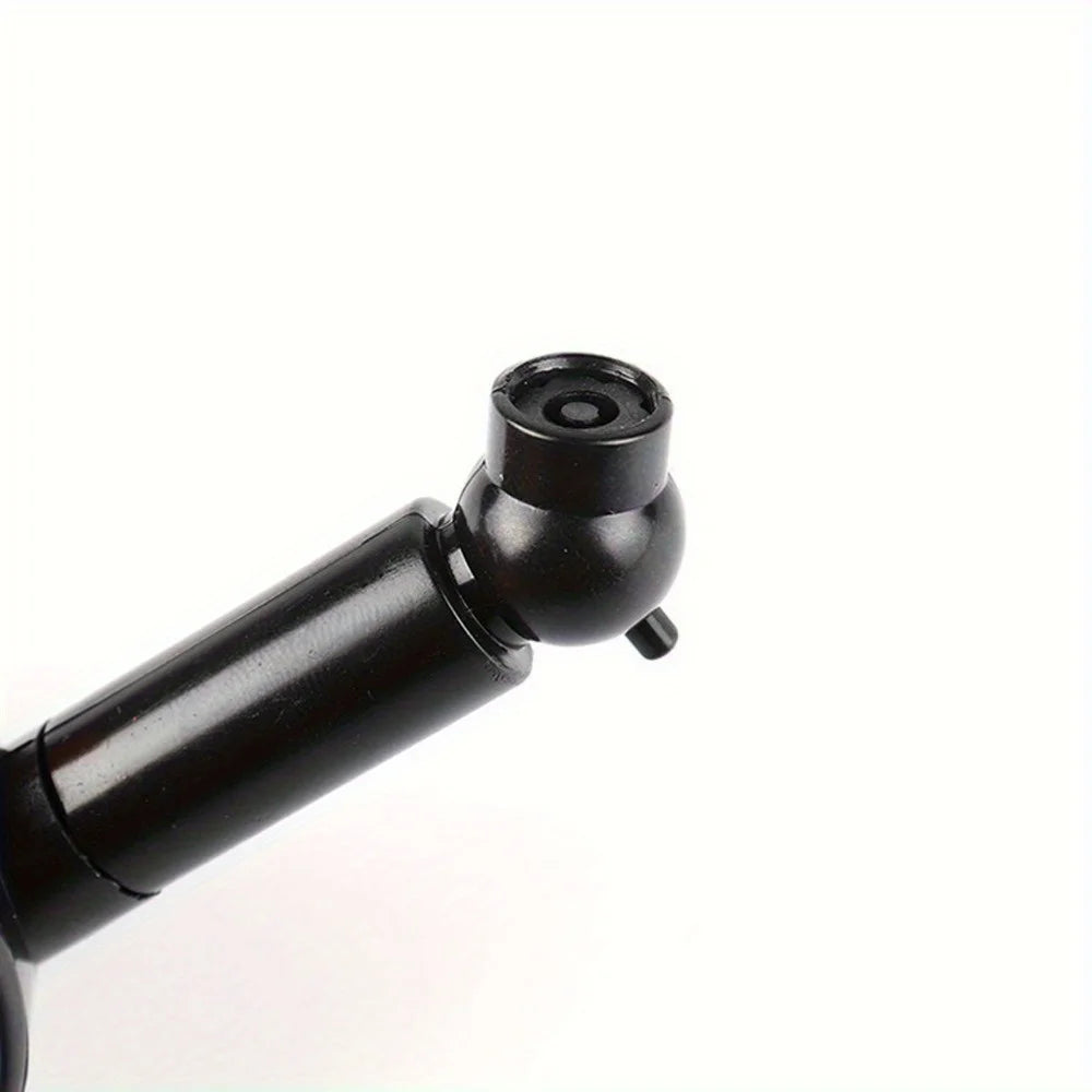 Analog Tire Pressure Gauge - Side profile showing brass valve chuck and black gauge body with bleed valve button | Wrench Haus