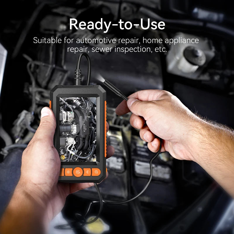 Industrial Borescope Inspection Camera - Technician using borescope to inspect engine bay, live feed shown on 4.3" color display | Wrench Haus