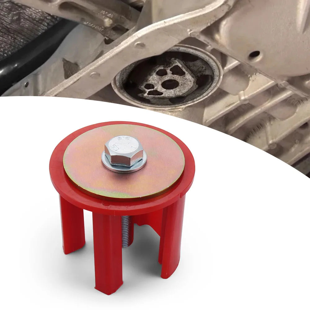 Dogbone engine mount insert, red insert with washer and bolt below mount opening | Wrench Haus